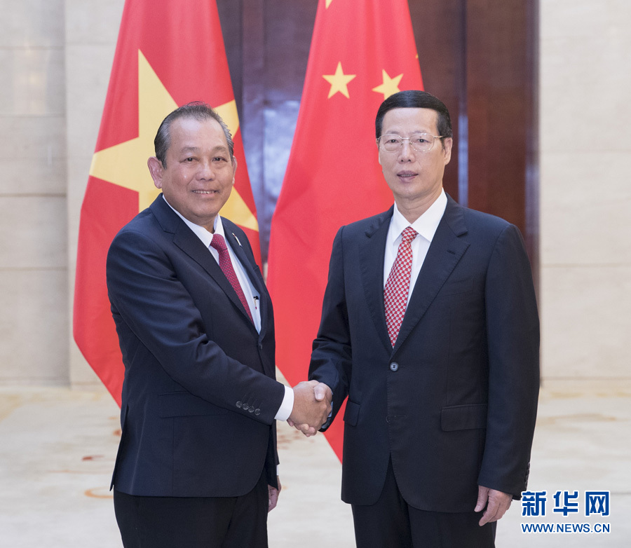  9月11日，中共中央政治局常委、國(guó)務(wù)院副總理張高麗在廣西南寧會(huì)見前來出席第十四屆中國(guó)－東盟博覽會(huì)和中國(guó)－東盟商務(wù)與投資峰會(huì)的越南常務(wù)副總理張和平。新華社記者王曄攝