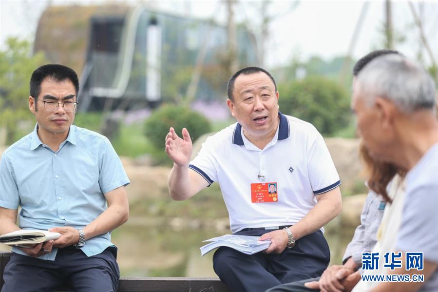 （新華全媒頭條·兩會精神看落實·圖文互動）（2）整體謀劃、系統(tǒng)升級、全面提升——落實全國兩會精神織牢織密公共衛(wèi)生防護網(wǎng)