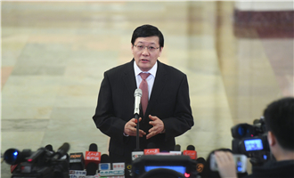 全國社?；鹄硎聲硎麻L樓繼偉接受采訪